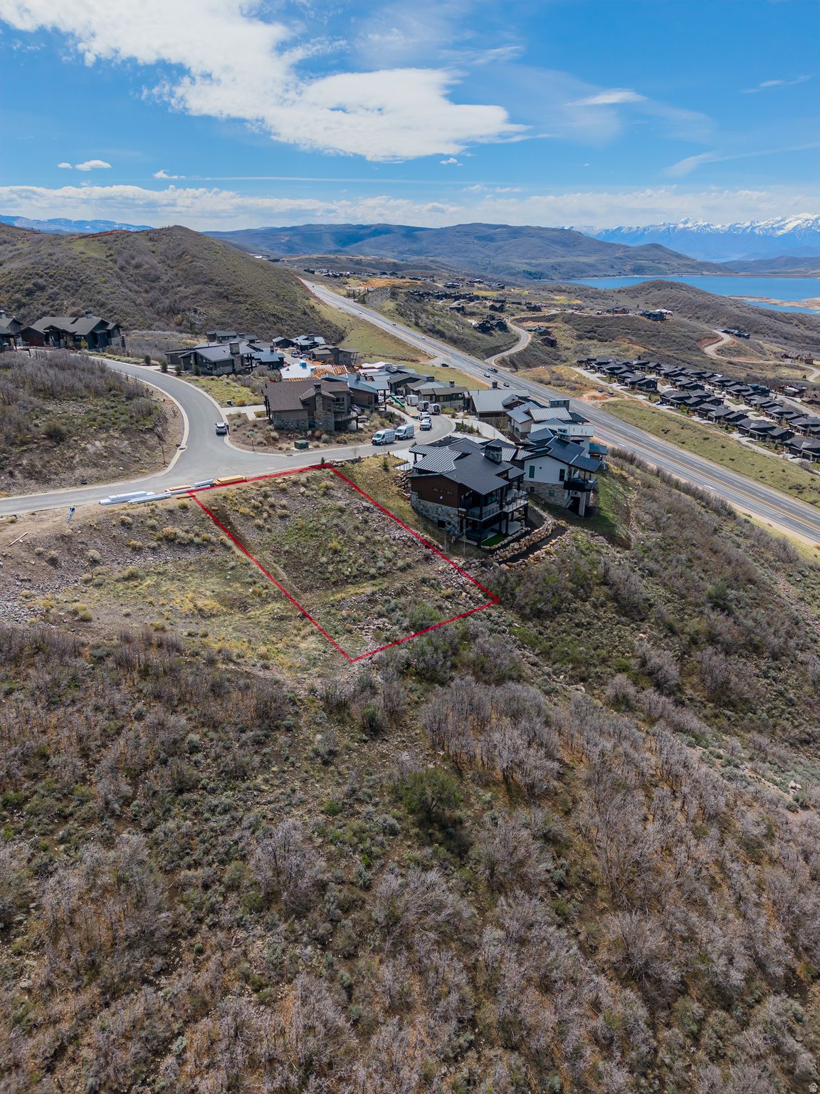 Aerial drone view of 11461 N White Tail Court with red lot boundary lines, Soaring Hawk community, Hideout Utah